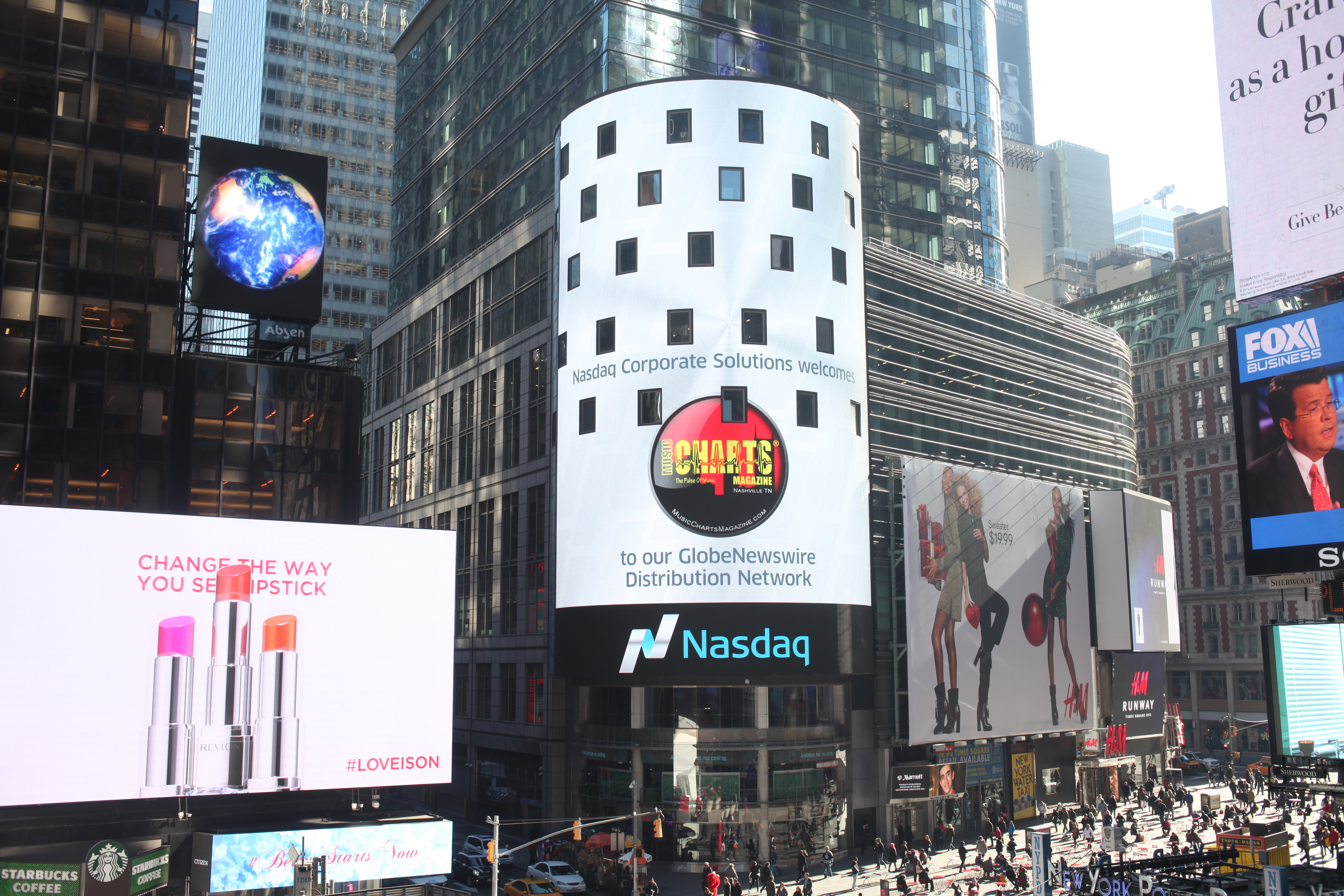 Music Charts Magazine® logo proudly flies high on the Nasdaq MarketSiteTower in New York City’s world famous Times Square.